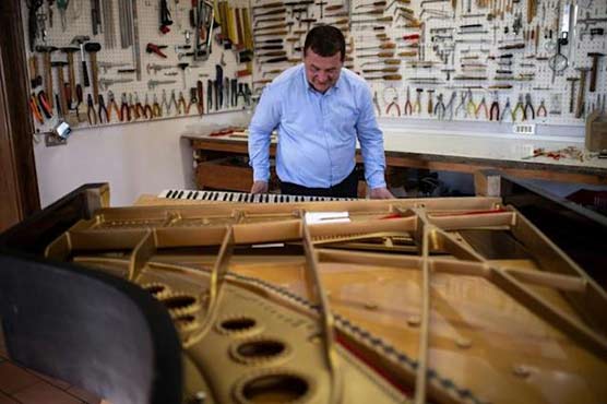 Italian piano maker sees craft threatened with extinction