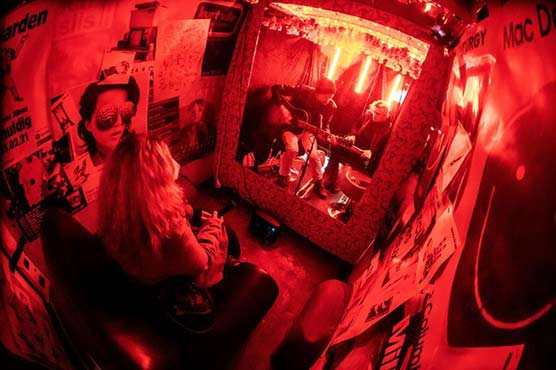 German band turn van into club so fans can rock out one at a time