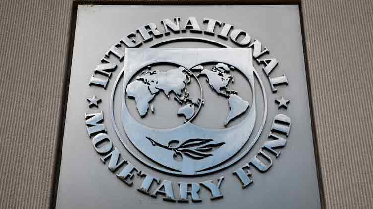 IMF slashes global outlook as White House says trade talks pick up pace