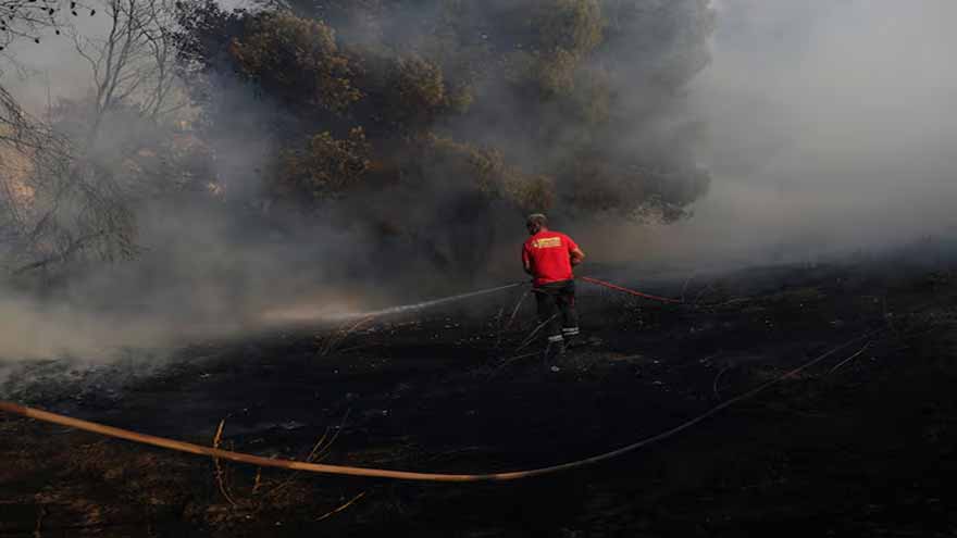 Greece wildfire contained but strong winds prompt evacuations