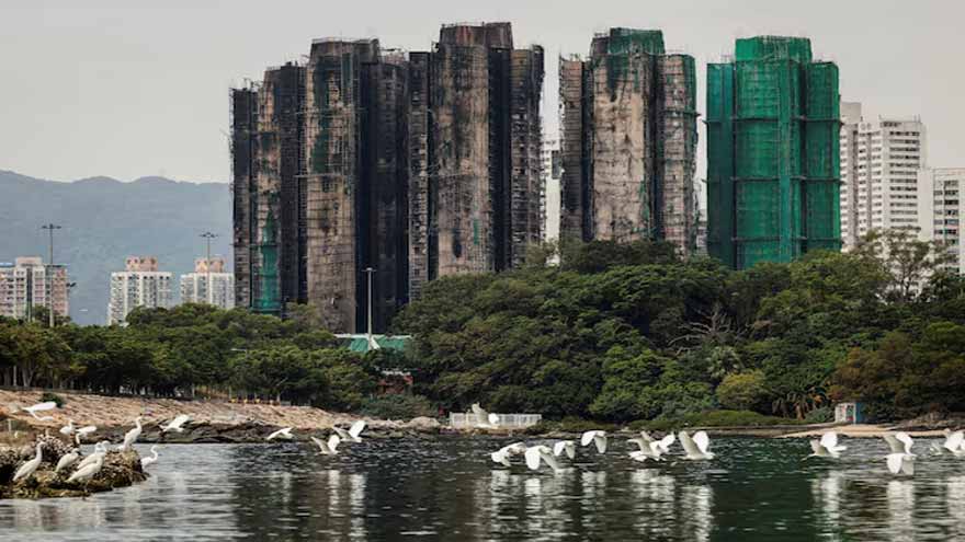 Hong Kong leader says fire probe expected to conclude within 9 months