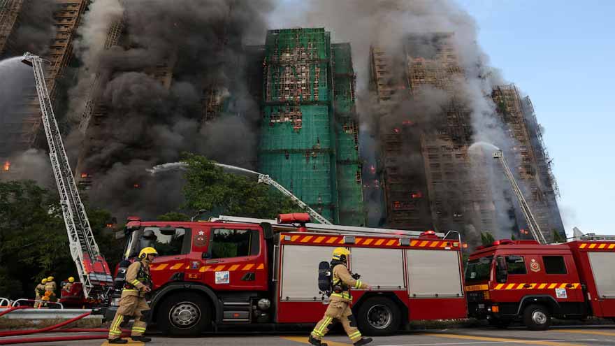 Fire engulfs Hong Kong residential building killing at least 36 people, trapping others