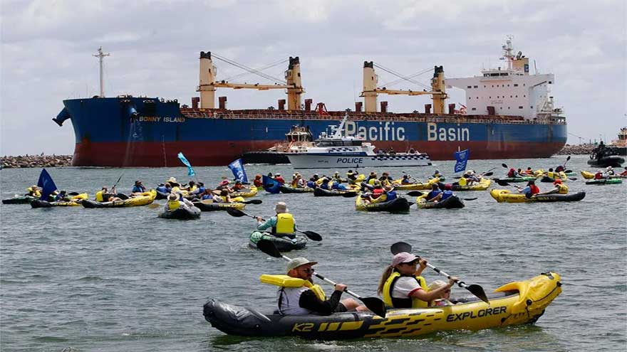 Australia climate change protest disrupts shipping at coal port, 21 arrested