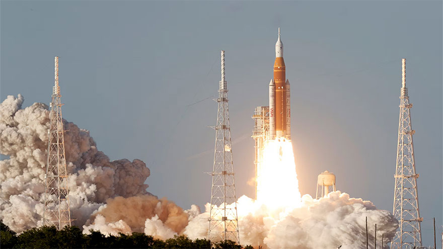 Astronauts begin NASA lunar mission after climactic blast-off