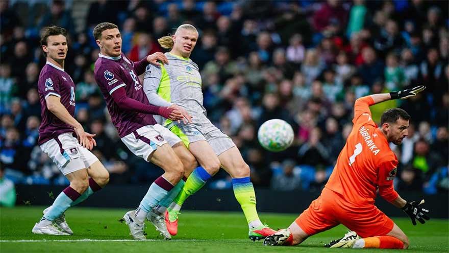 Manchester City go top of Premier League as Burnley relegated