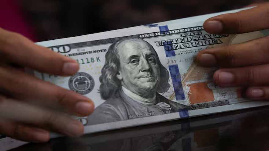 Dollar steady as investors brace for Fed decision in face of war