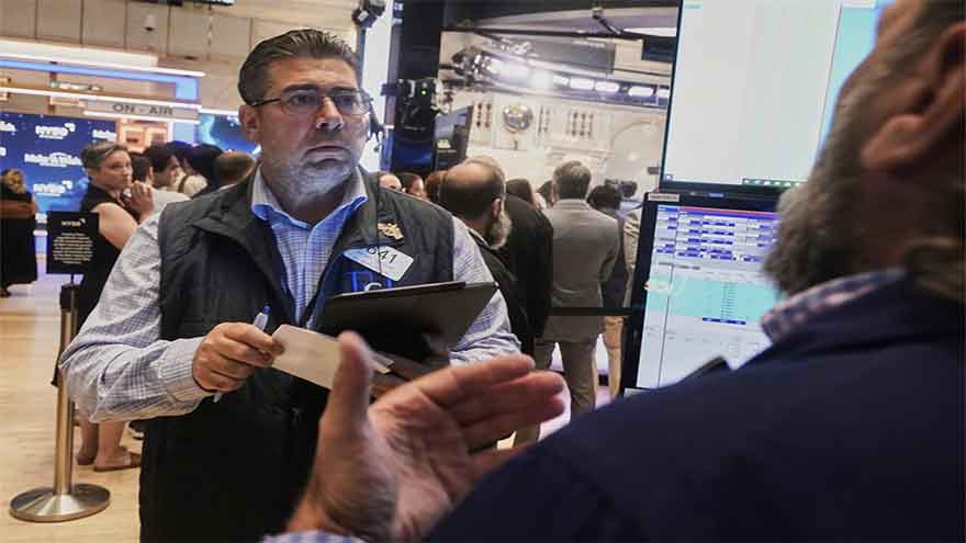 Wall Street drops from its records and oil prices jump as uncertainty rises about the Iran war