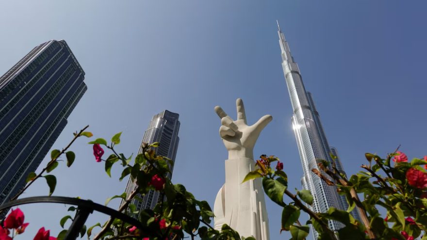 UAE says air defences dealing with missile and drone attacks from Iran